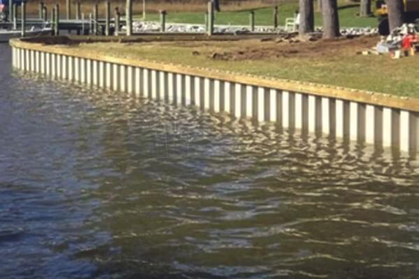 Galvanized steel bulkhead construction along Fox River Illinois