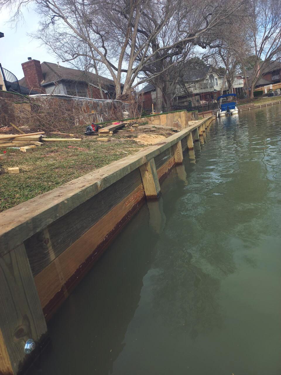 Wood Bulkhead on Mill Lake in Sugar Land
